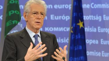 Mario Monti under sitt första besök i Bryssel som italiensk premiärminister .